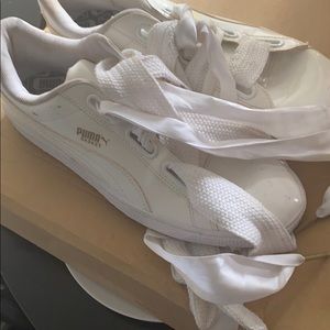 White patent leather pumas